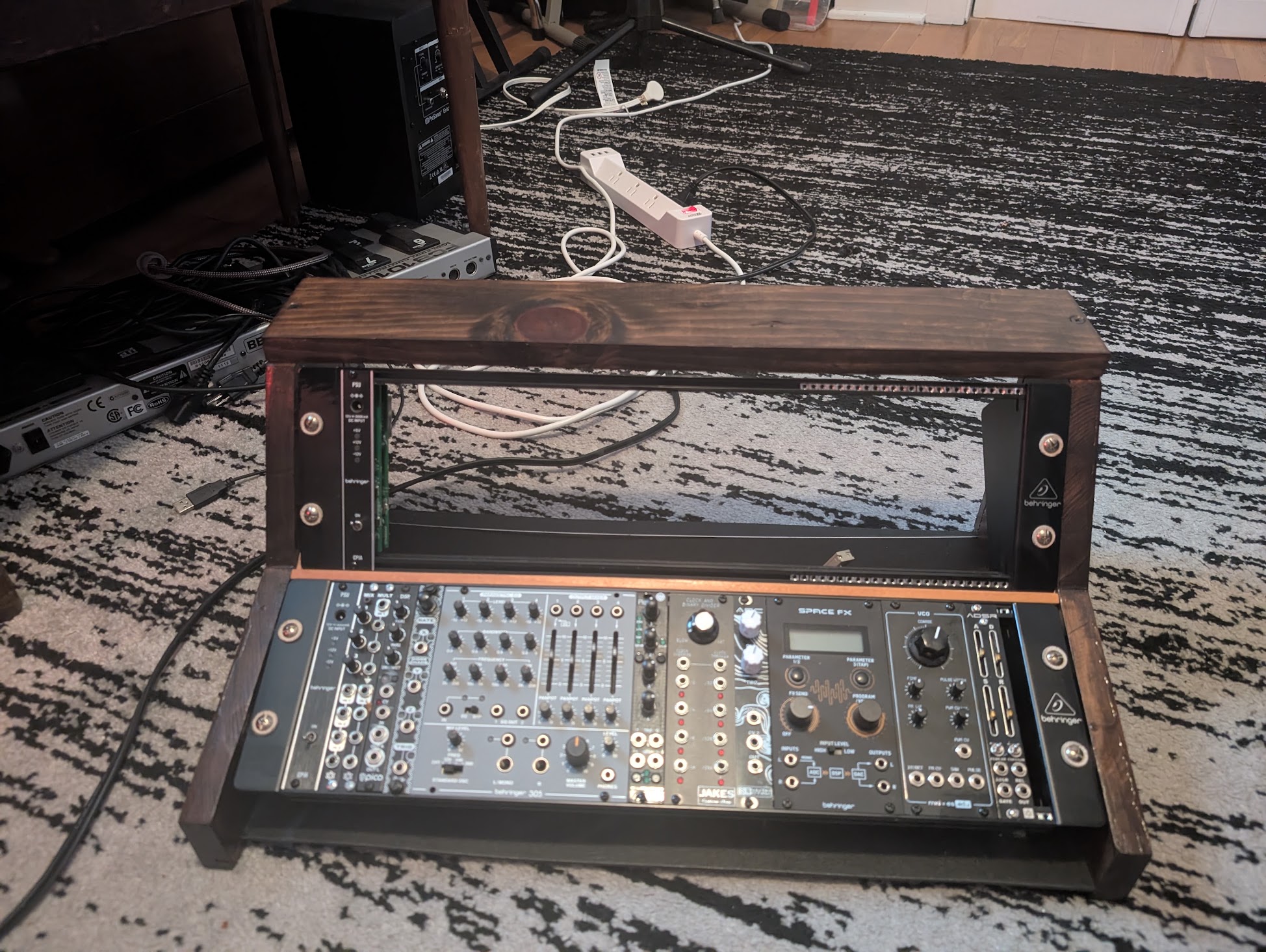 Finished modular rack housing; the top row of of the rack is now nearly filled.